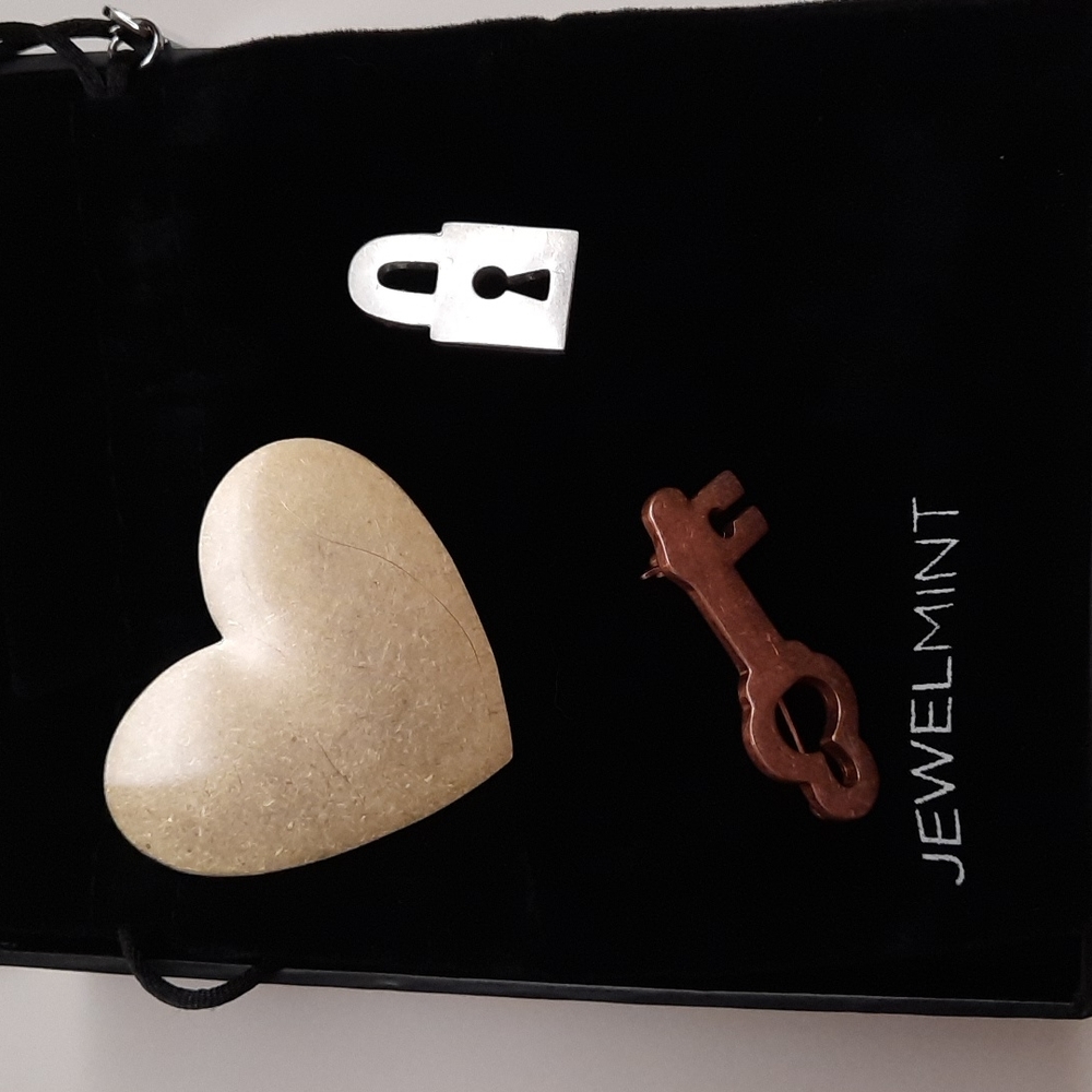 Set of 3 metal pins. Lock (silver tone), key (copper tone) and heart (gold tone)